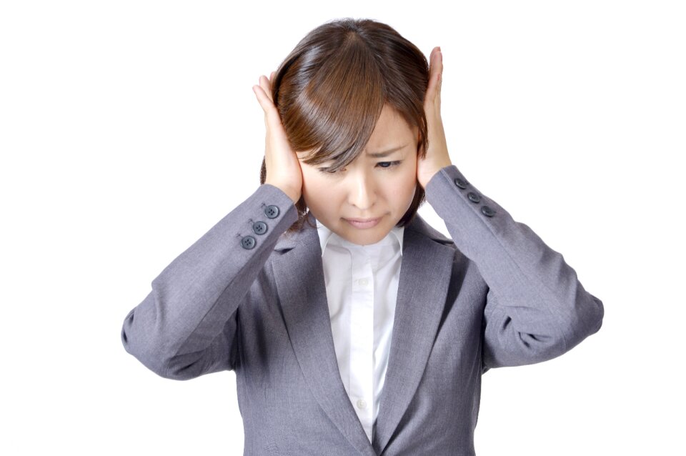 Business woman close ears