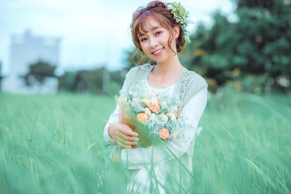 Woman girl grass bouquet