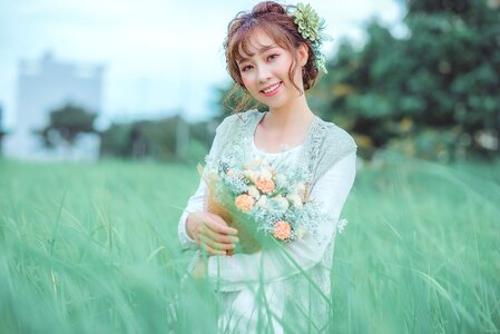 Woman girl grass bouquet