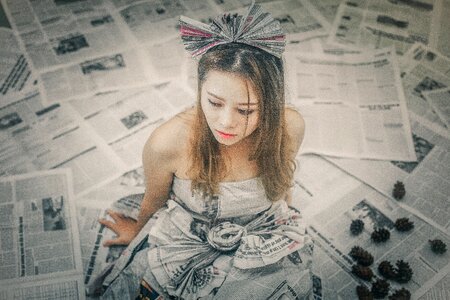 Woman girl newspaper portrait