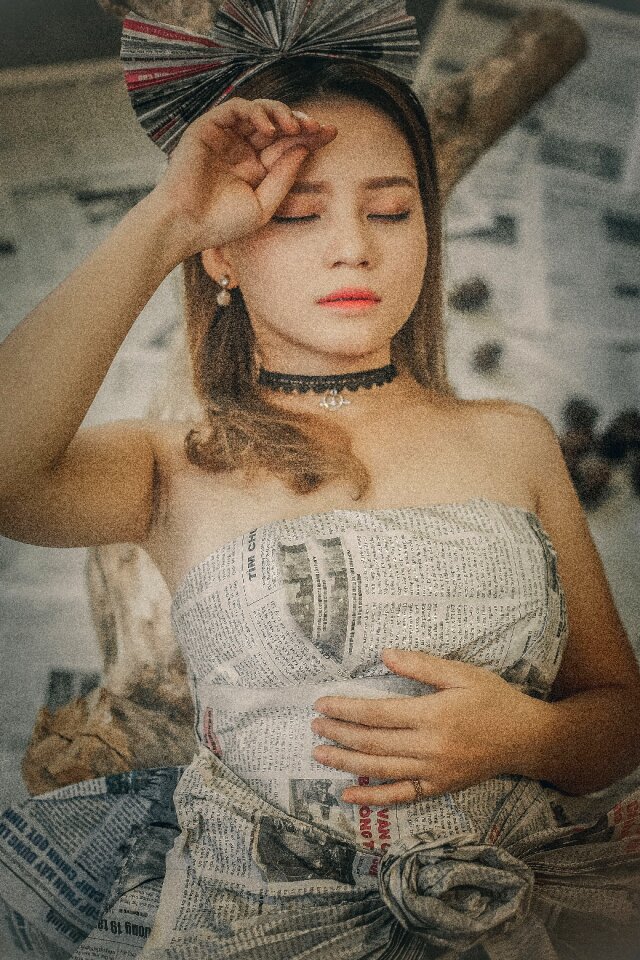 Woman girl newspaper portrait