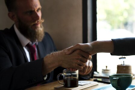 Business people handshake photo