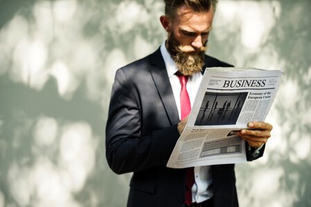 Businessman reading newspaer