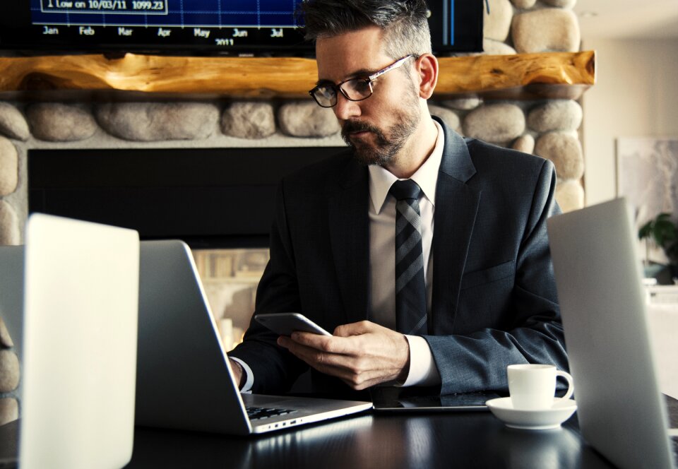 Businessman smartphone laptop computer
