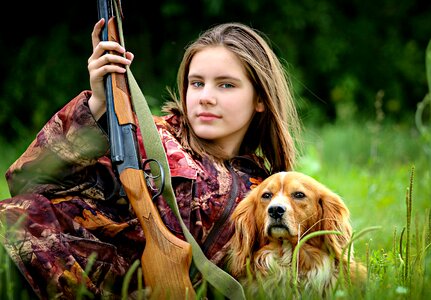 Girl hunthing dog