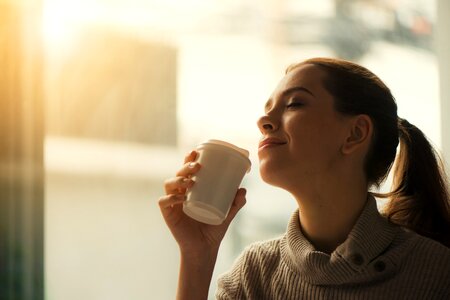 Girl woman drink coffee photo