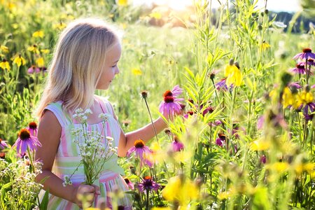 Little girl grass flower photo
