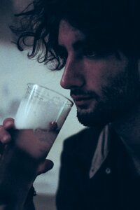 Man drinking beer photo