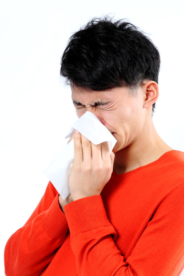 Man portrait blow nose