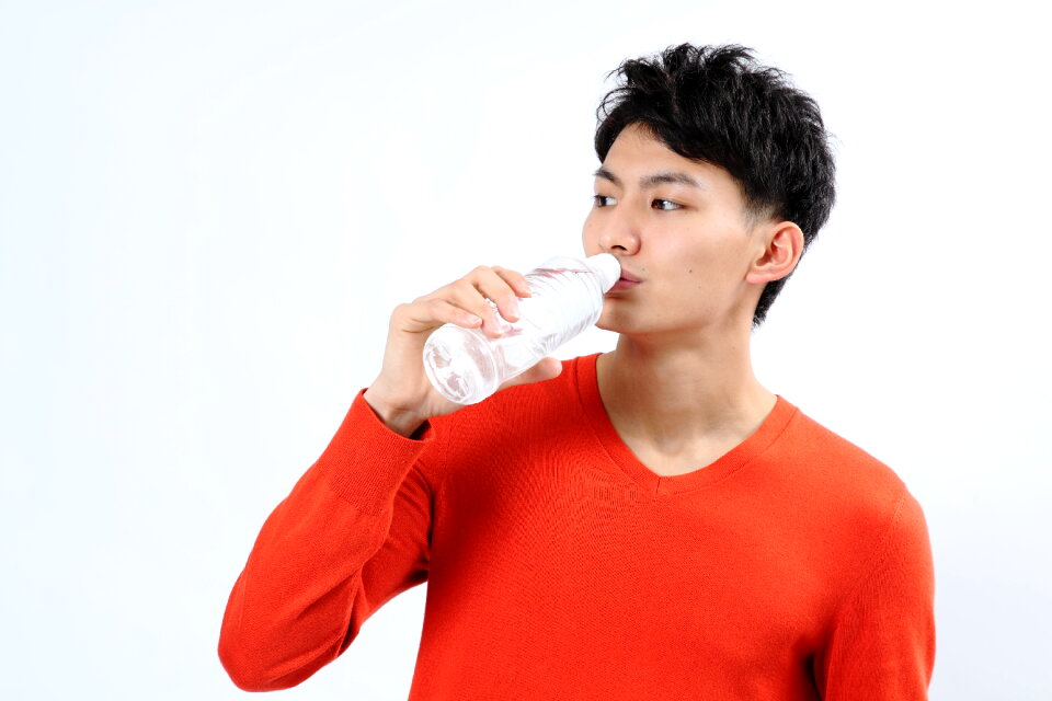 Man portrait drinking