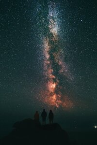 Milky way three people photo