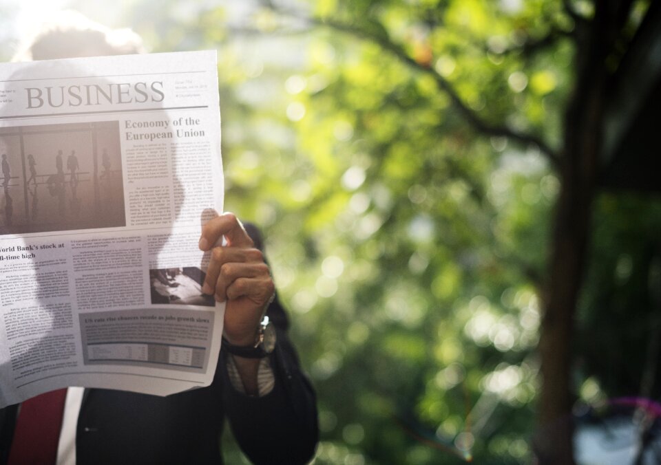 Newspaper business man
