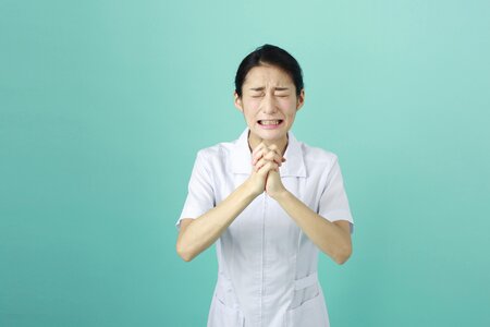Nurse praying photo
