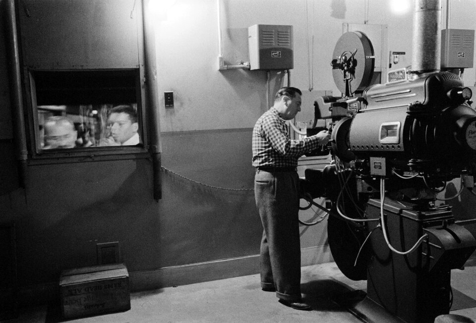 Projector operator movie theater