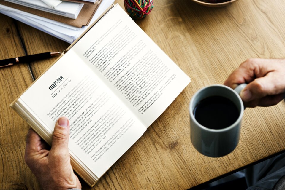 Reading book coffee