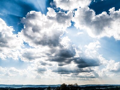 Sky clouds sunbeam
