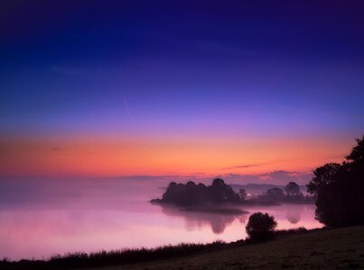 Sunrise lake fog photo