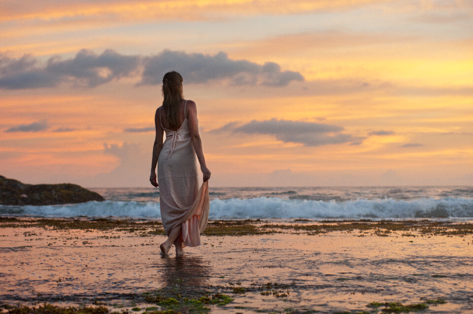 Sunset beach woman
