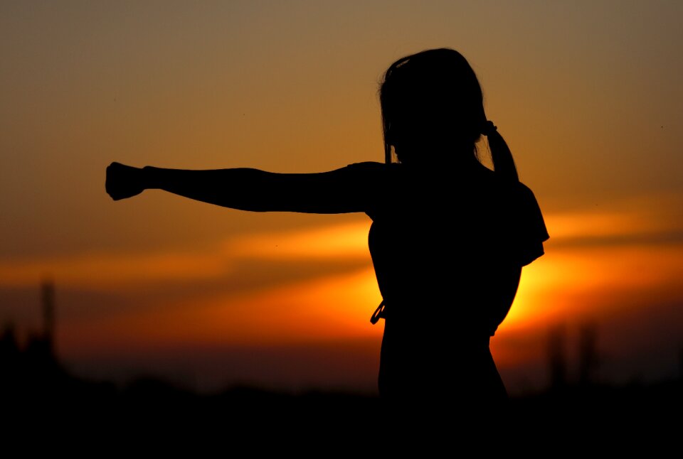Sunset punch woman silhouette