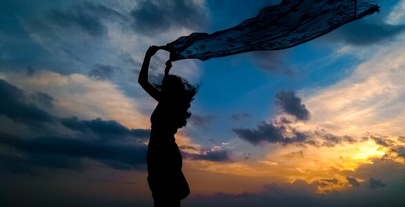 Sunset silhouette woman photo