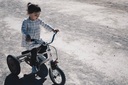 Tricycle child girl photo