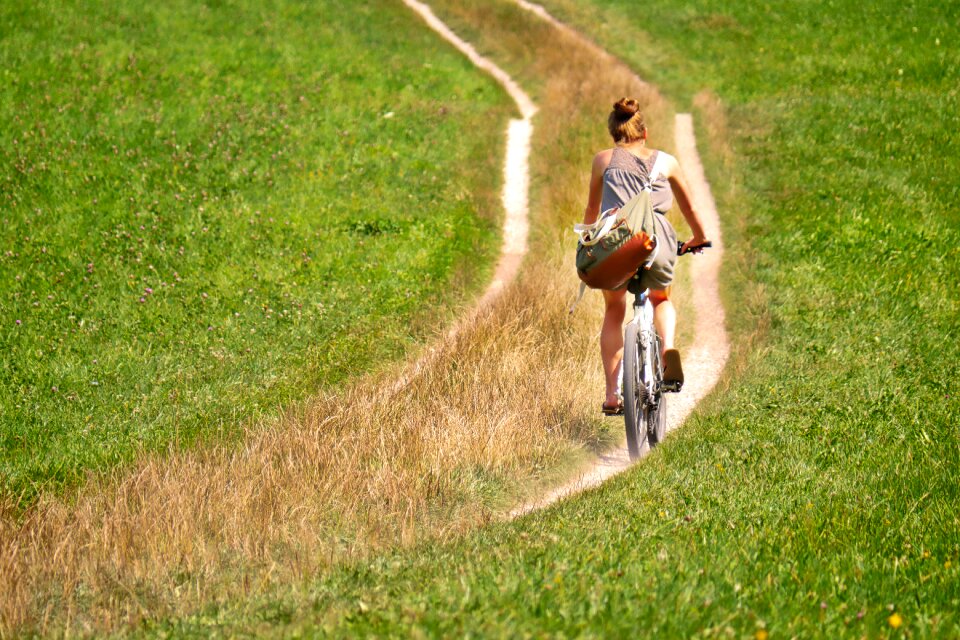 Woman cycling bicycle