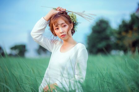 Woman girl grass bouquet