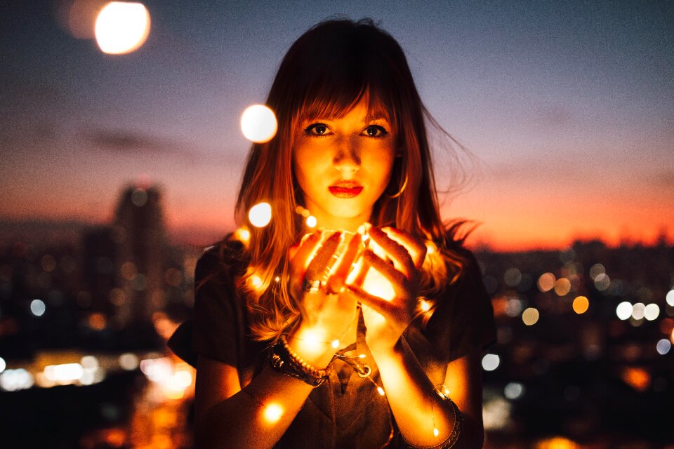 Woman girl lights sunset