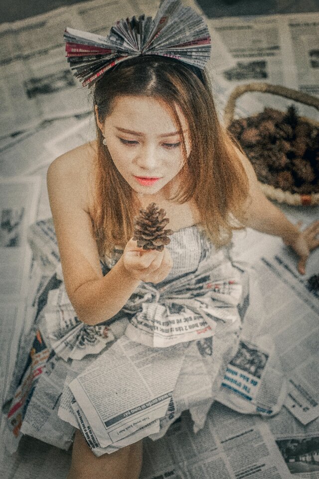 Woman girl newspaper portrait