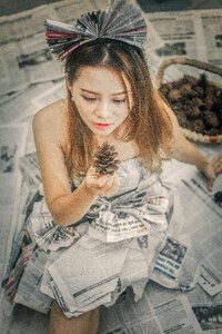 Woman girl newspaper portrait