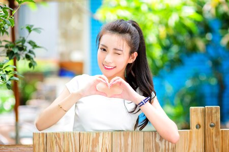 Woman girl wink heart photo