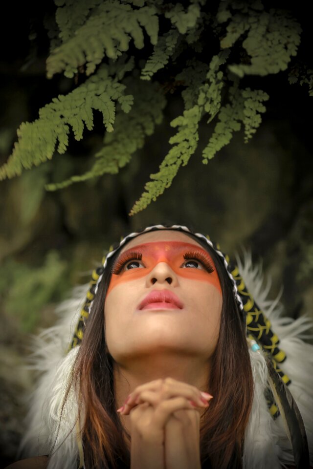 Woman native american pray