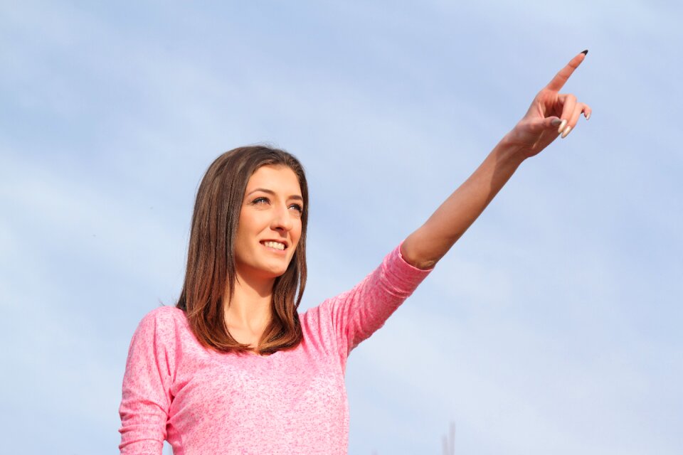 Woman portrait pointing