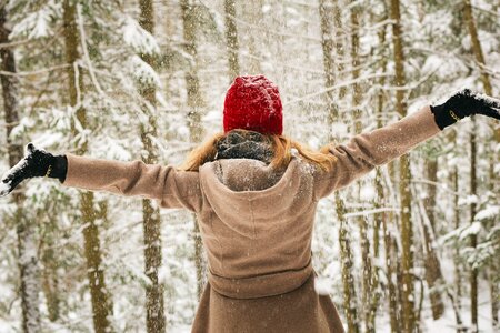 Woman snow joy photo