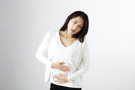 Woman stomachache photo