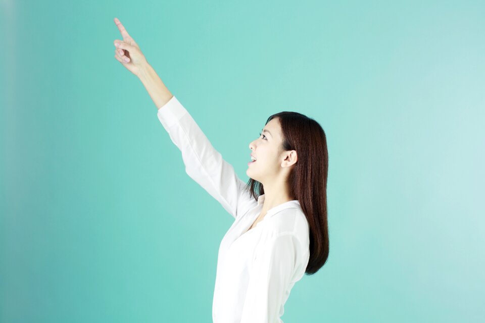 Business woman pointing finger