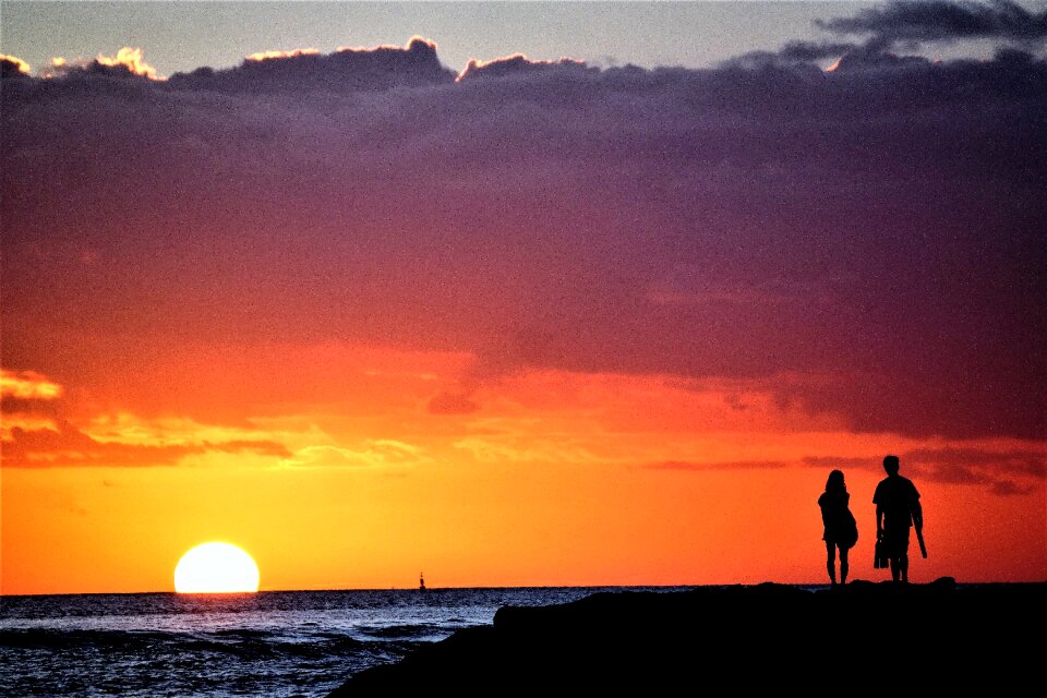 Sunset couple silhouette photo