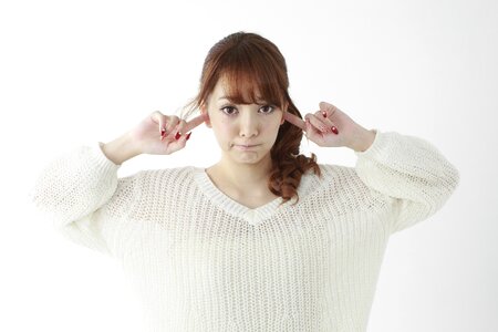 Woman girl cover ears