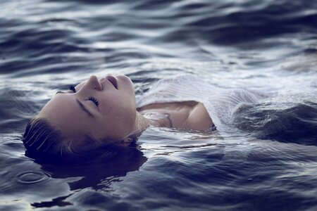 Woman sea bathing photo
