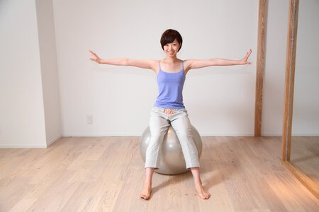 Woman girl exercise ball photo