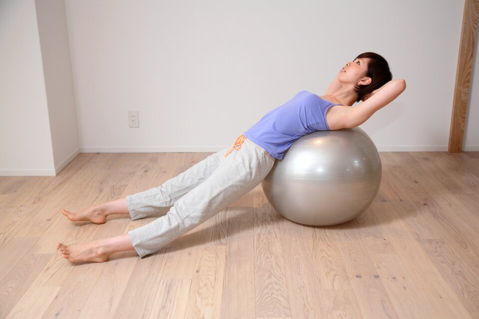 Woman girl exercise ball