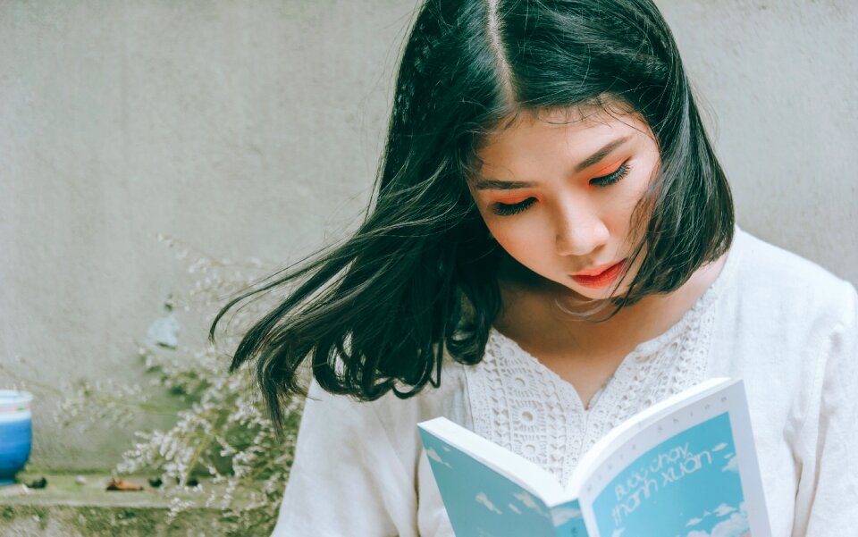 Woman girl reading book