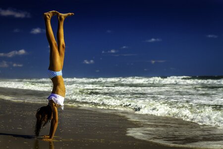 Beach handstand girl photo