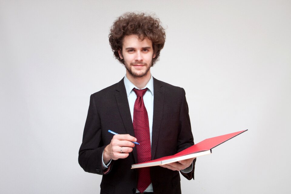 Business man book pen
