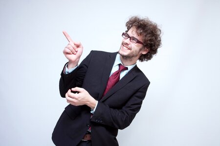 Business man pointing finger photo