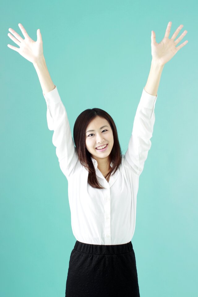 Business woman banzai joy