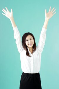 Business woman banzai joy