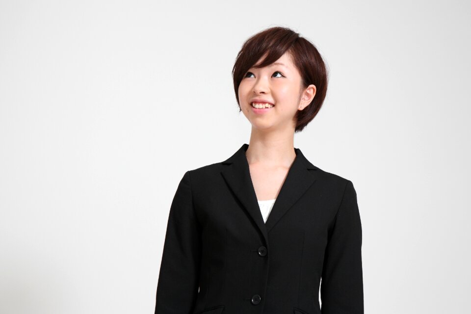 Business woman looking up