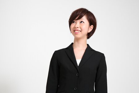 Business woman looking up