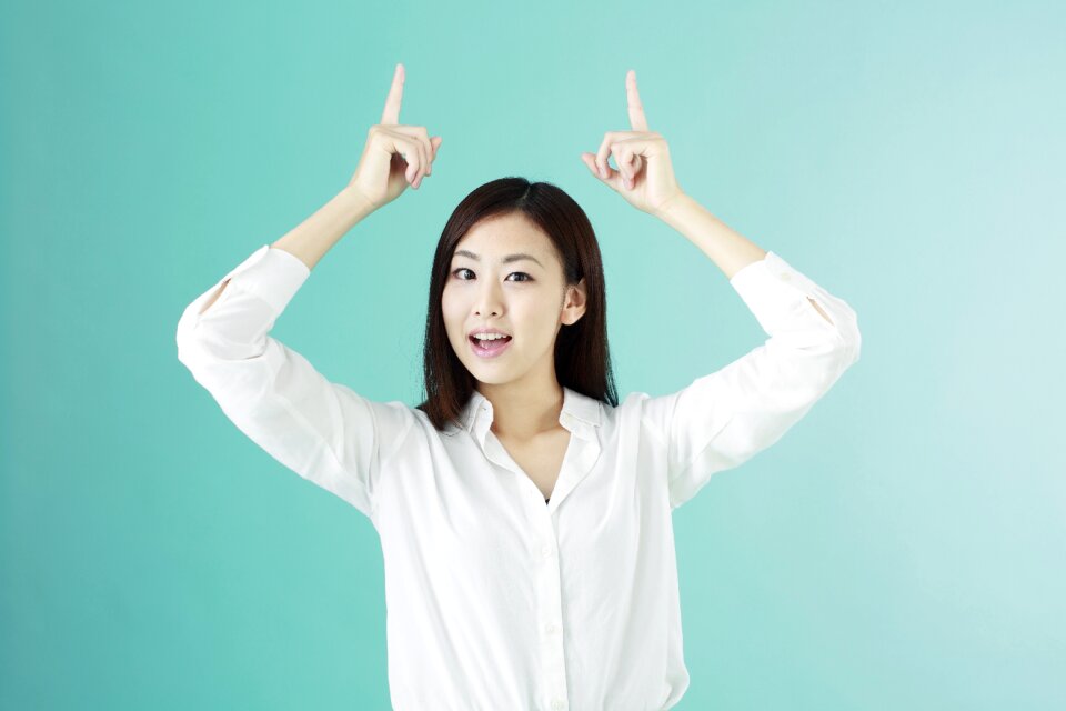 Business woman pointing finger